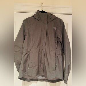 New w/o tags.  Raincoat. Never worn too small for me.